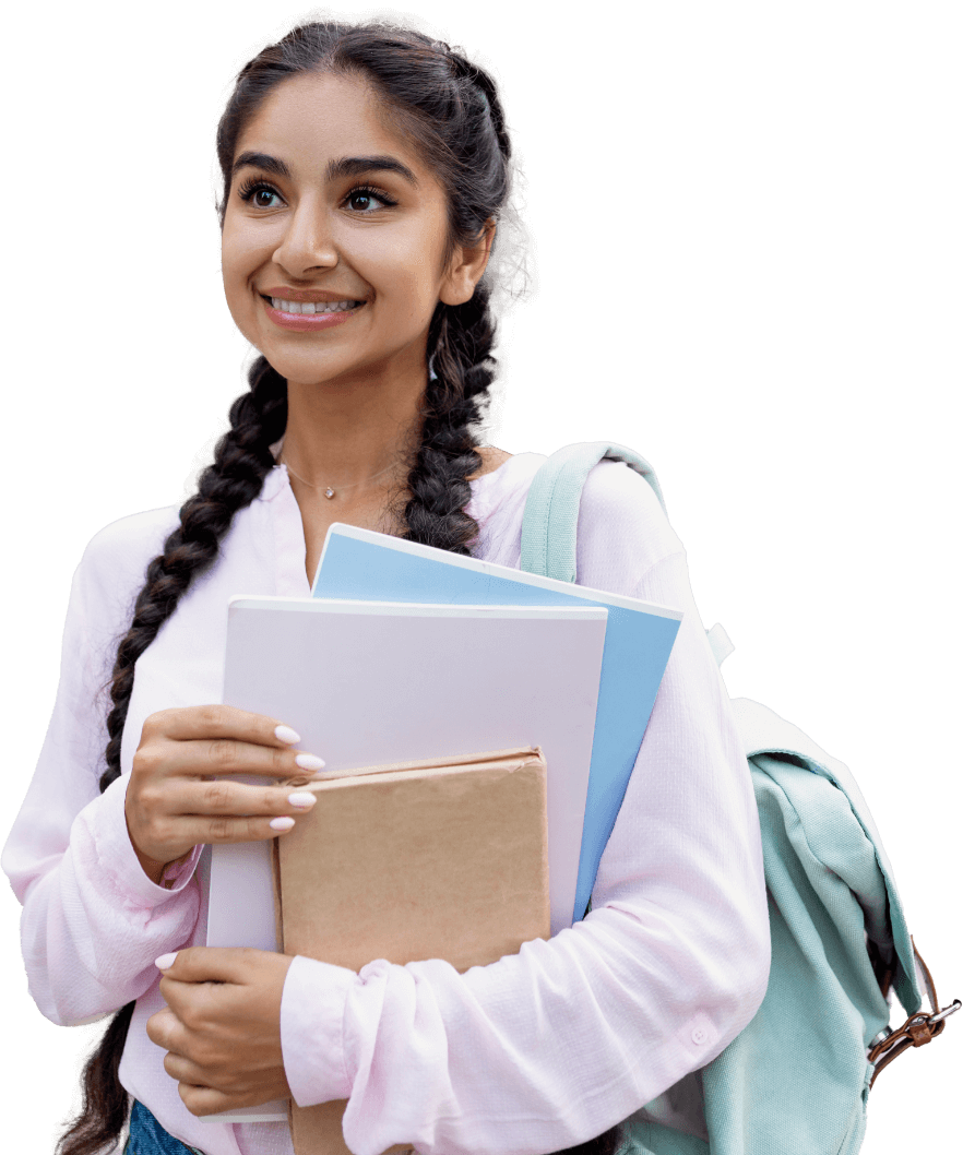 Female student smiling, holding notebooks in her hands, wearing a white blouse.