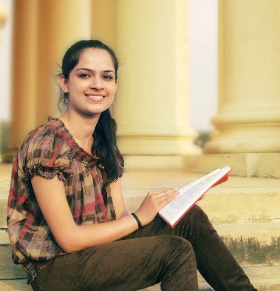 Woman with her hair up, smiling