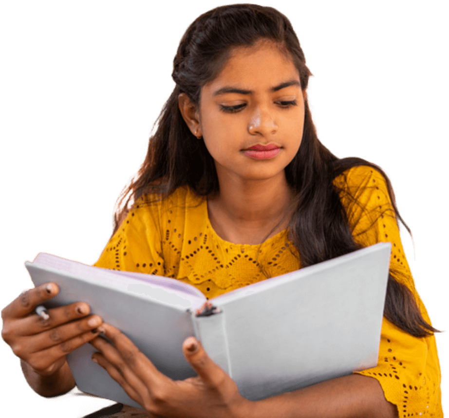 Student reading a notebook